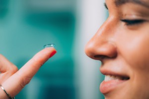 Ophthalmology. Soft contact lens insertion.